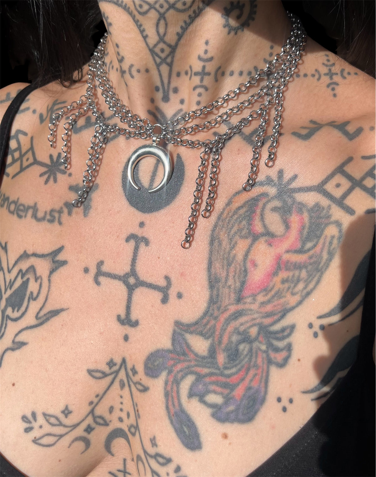 Handmade silver-tone layered chain necklace with crescent moon pendant from the Grunge Collection