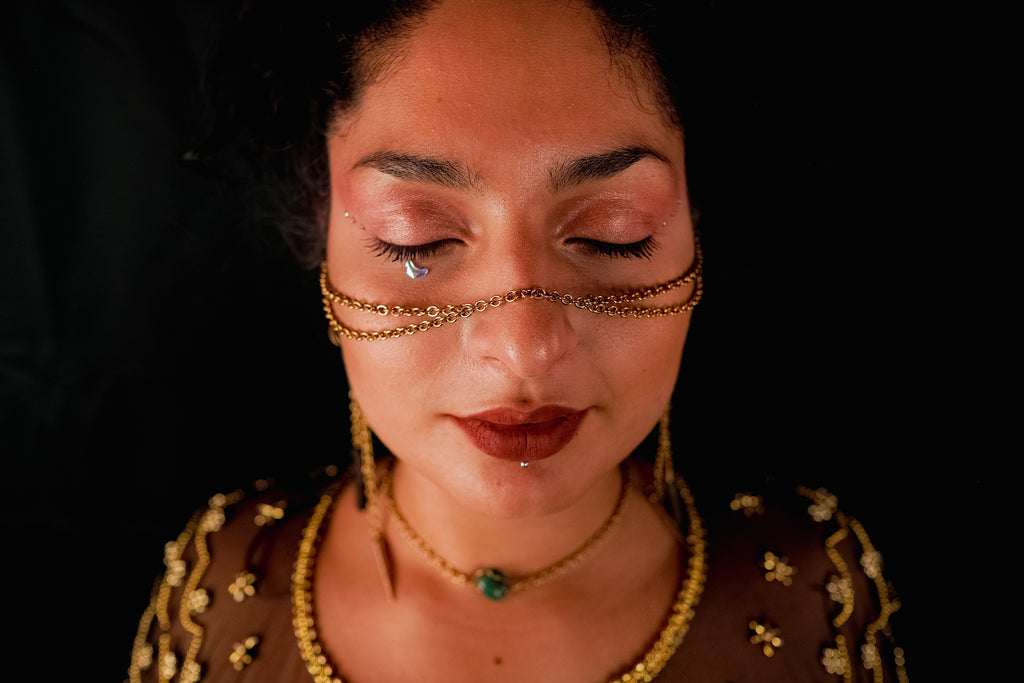 Golden face jewelry