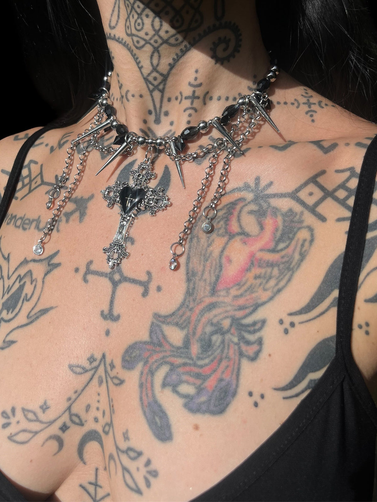 Black heart gothic cross necklace with spikes, chains and black glass beads
