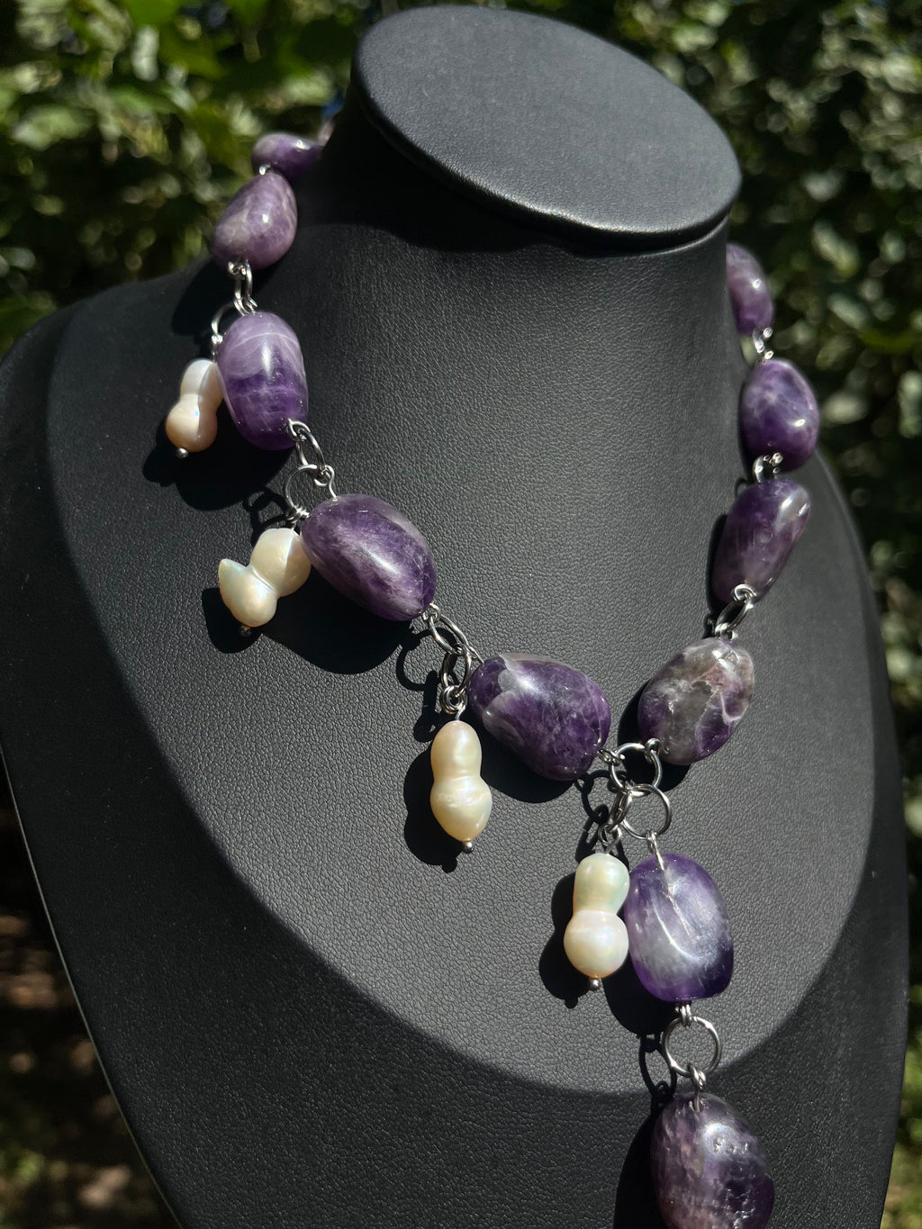 Amethyst and freshwater pearl statement necklace with natural purple stones and dangling pearls