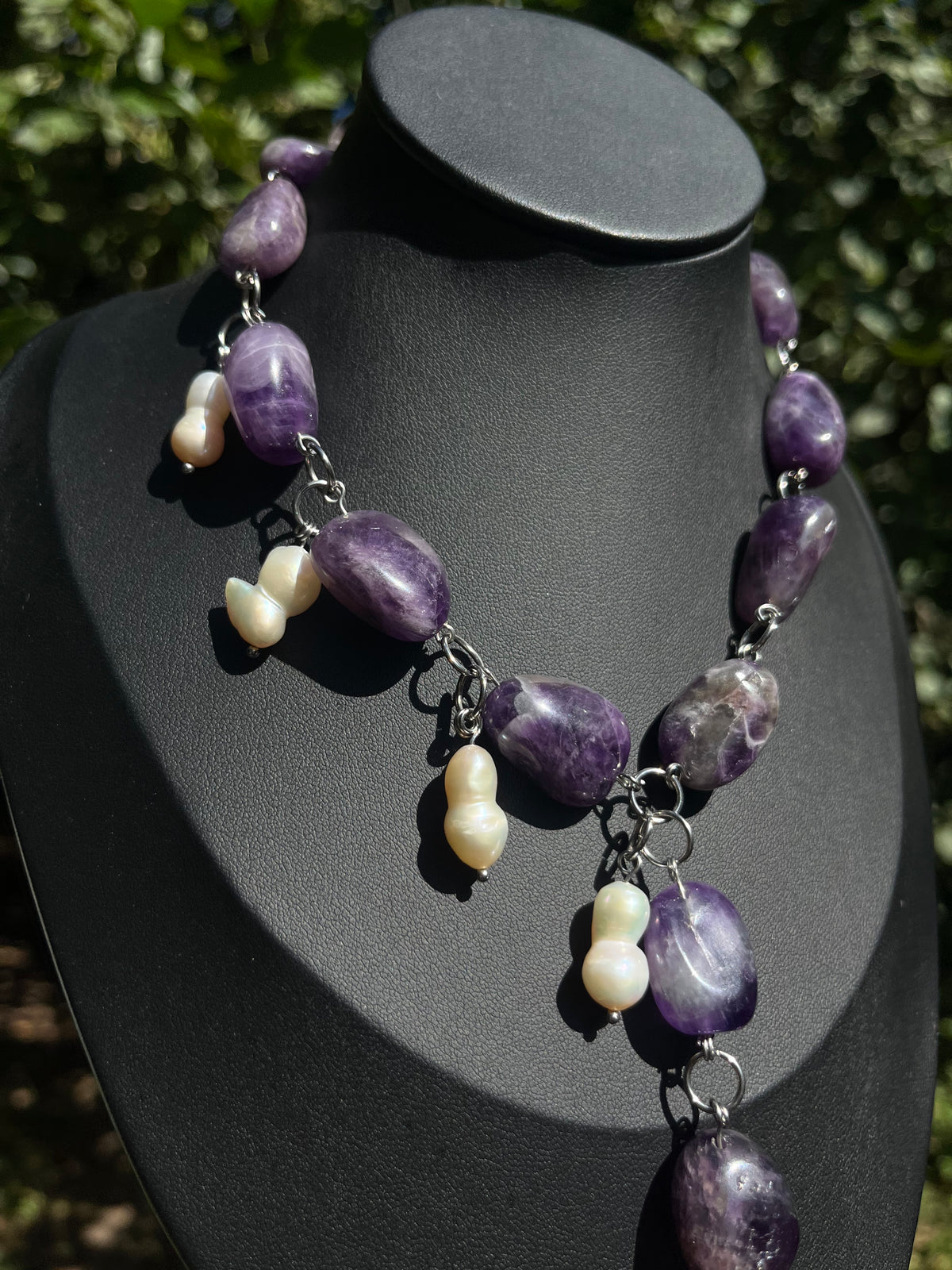 Amethyst and freshwater pearl statement necklace with natural purple stones and dangling pearls