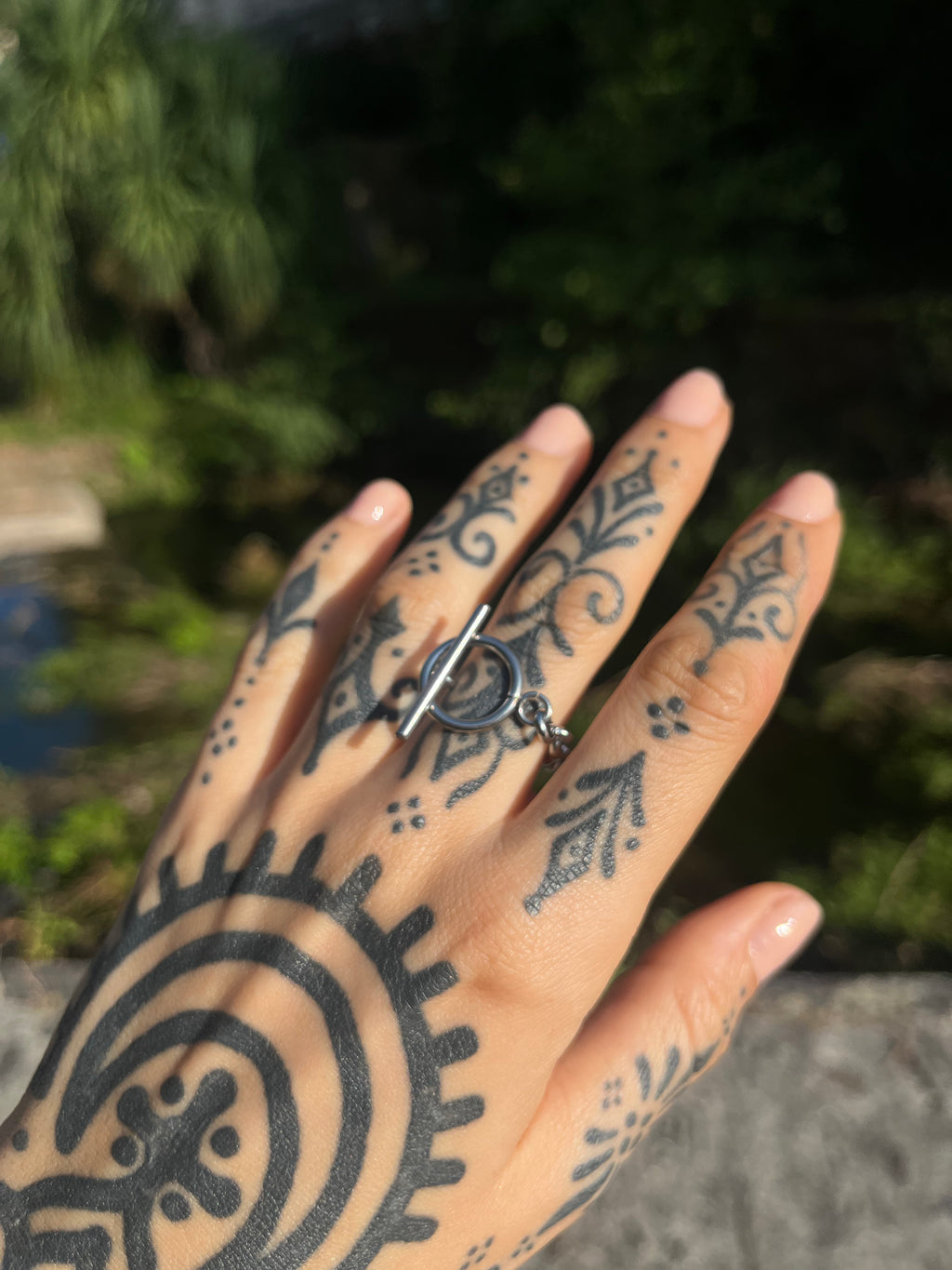 Toggle clasp ring