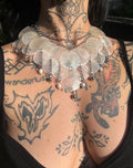 Layered mother-of-pearl shell statement necklace with stainless steel chains and freshwater pearls