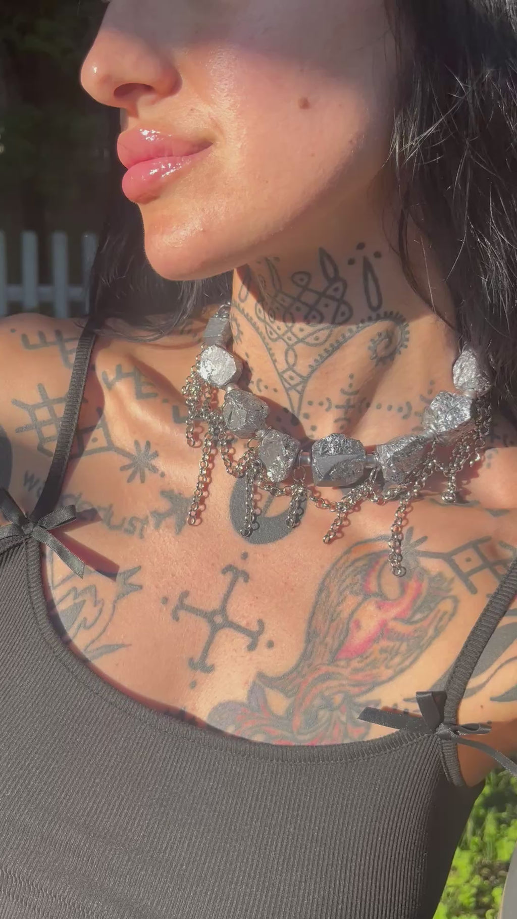Handmade Ocean’s Relic necklace featuring natural raw hematite, grey freshwater pearls and cascading silver-tone chains, inspired by the rocky coast of Galicia